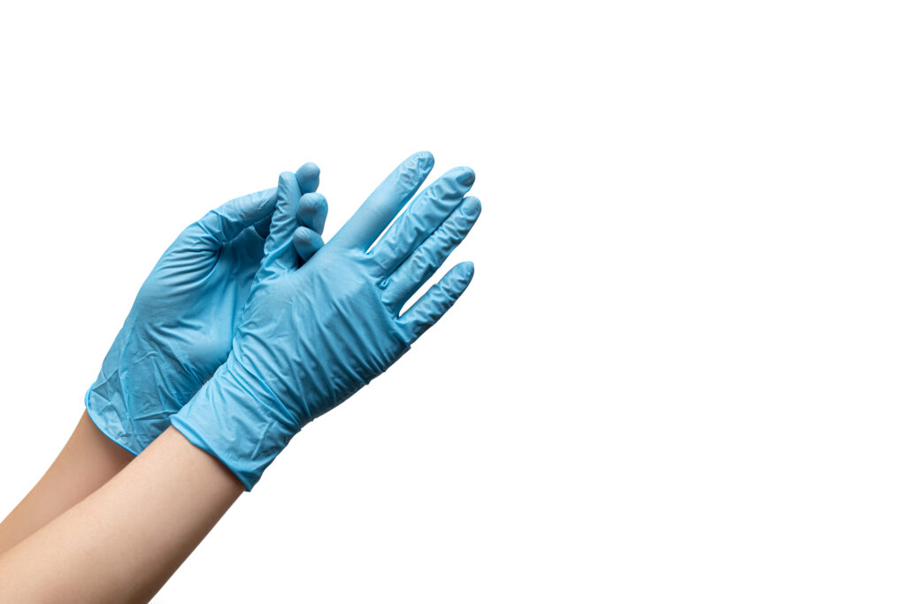 Medical gloves for treating wounds hygienically
